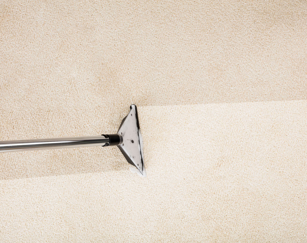 Dirty white carpet having wet carpet cleaning, Huddersfield